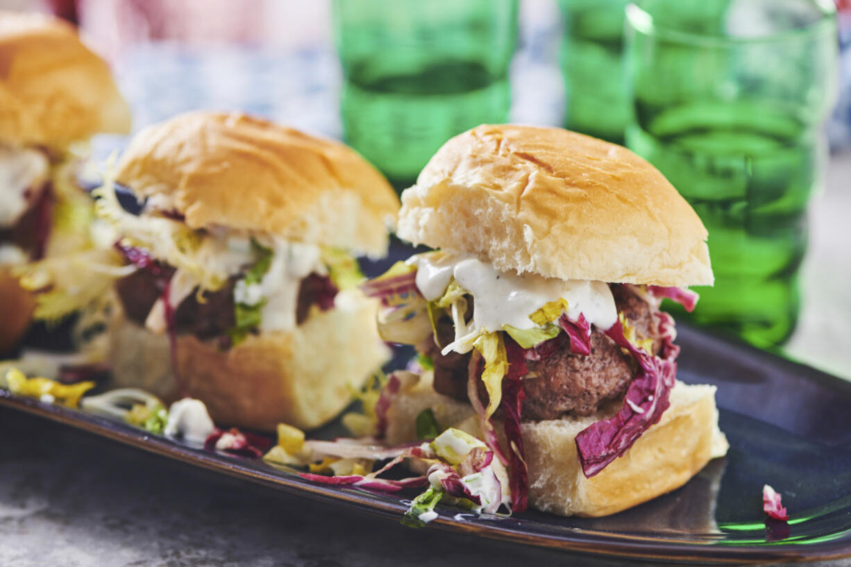 Chipotle Sliders with a colorful lettuce slaw and blue cheese dressing.