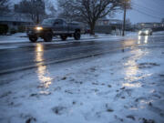 Motorists in southeast Vancouver carefully drive along icy roads Jan. 17.