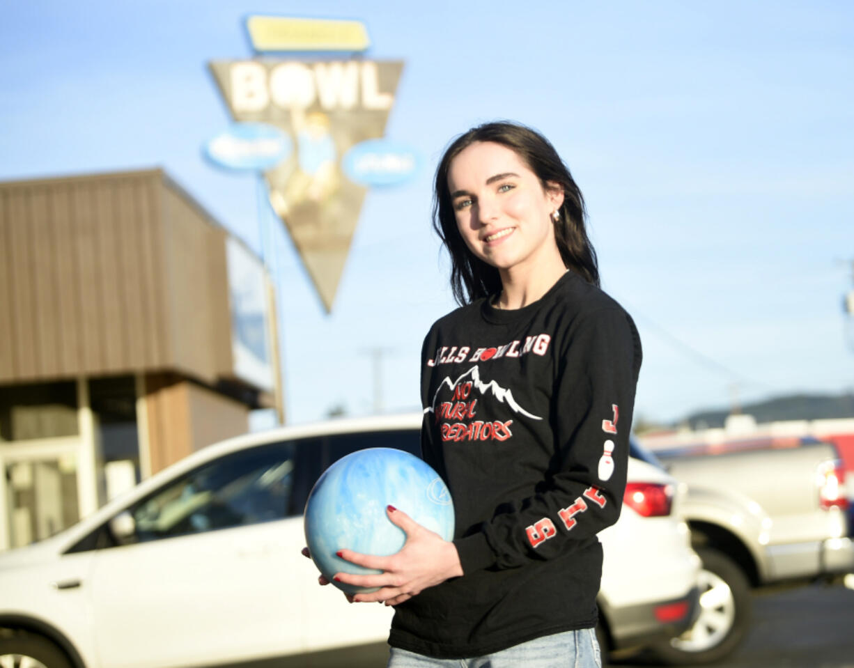 Lily Mattison of R.A. Long poses for a portrait at Triangle Bowl in Longview on Thursday, March 14, 2024.