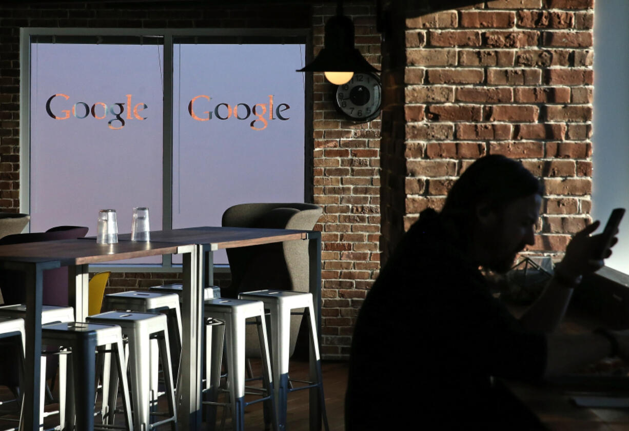 An employee sits in the cafeteria of Google&rsquo;s Washington headquarters, Jan. 8, 2015, in Washington, D.C.