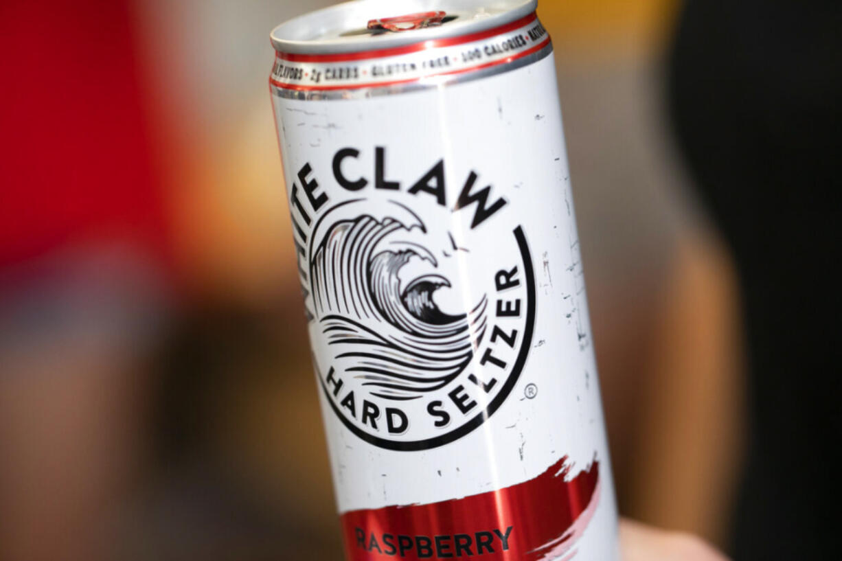 This Aug. 8, 2019, photo shows a White Claw in New Orleans. Sales of White Claw and other fruity, alcoholic seltzers soared this summer as drinkers looked for lighter, healthier options.
