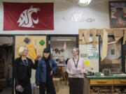 From left: Washougal School District Superintendent Mary Templeton joins U.S. Rep. Marie Gluesenkamp Perez, D-Skamania, and Margaret Rice, career and technical education director, during a tour of the woodshop at Washougal High School on Jan. 24. Templeton announced last month that she will take a pay cut next school year to help alleviate the district&rsquo;s $3 million deficit.