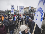 Tractors are parked in market square during &ldquo;a food march&rdquo; in Kuopio, Finland, Friday, as farmers protest against perceived inequalities in food production profits.