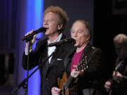 Art Garfunkel, left, and Paul Simon perform June 10, 2010, during the 38th AFI Life Achievement Award honoring Mike Nichols at Sony Pictures Studios on in Culver City, Calif.