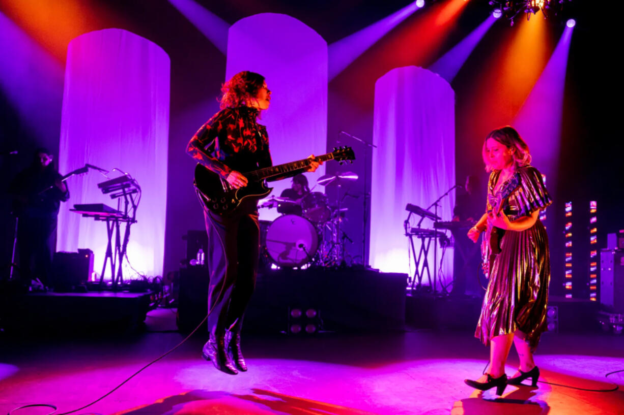 Carrie Brownstein, left, and Corin Tucker of Sleater-Kinney perform March 21 at the Riviera Theatre in Chicago.