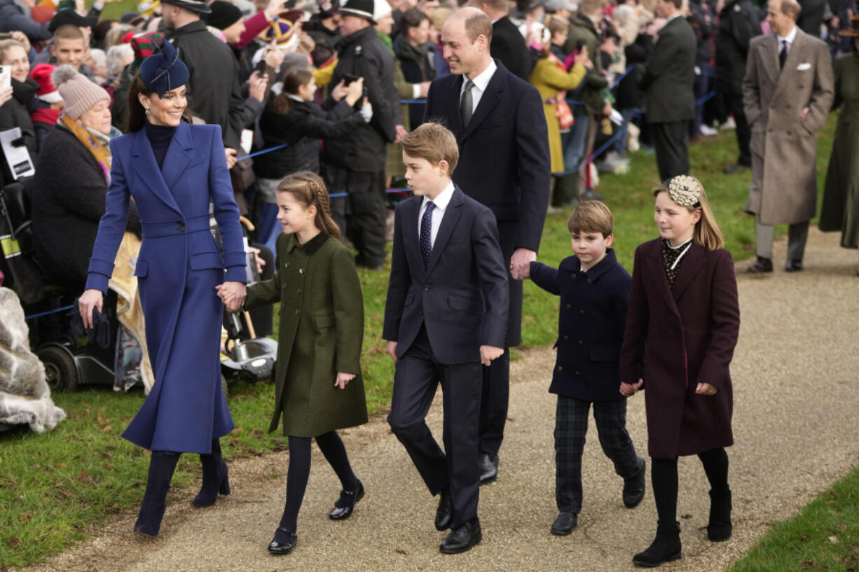 Britain&rsquo;s Kate, Princess of Wales, from left, Princess Charlotte, Prince George, William, the Prince of Wales, Prince Louis and Mia Tindall arrive Dec. 25 to attend the Christmas Day service at St. Mary Magdalene Church in Sandringham in Norfolk, England.