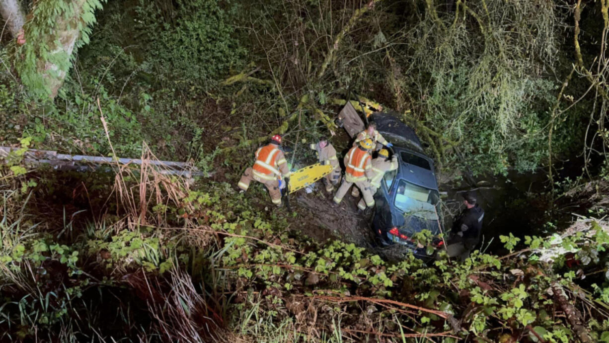 It took 20-plus first responders from multiple rescue agencies to remove a driver from a vehicle after it tumbled into a ravine Wednesday night.