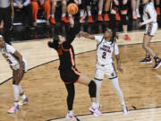 Oregon State forward Timea Gardiner (30) puts up a shot against South Carolina forward Ashlyn Watkins (2) during the fourth quarter of an Elite Eight round college basketball game during the NCAA Tournament, Sunday, March 31, 2024, in Albany, N.Y.