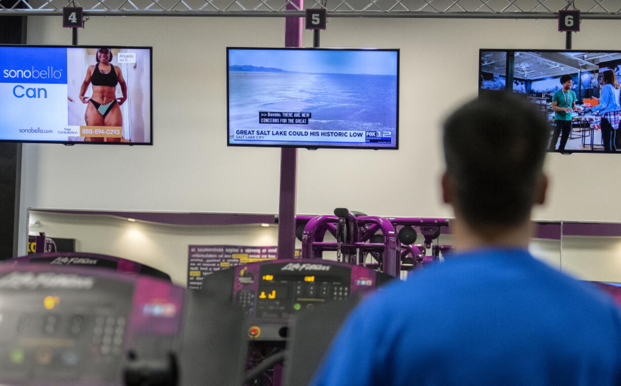 Amanda Cowan/The Columbian files Local television stations and local AM/FM radio stations in Washington continue to find viewers, including in gyms, like the Planet Fitness location in Hazel Dell.