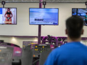 Amanda Cowan/The Columbian files Local television stations and local AM/FM radio stations in Washington continue to find viewers, including in gyms, like the Planet Fitness location in Hazel Dell.