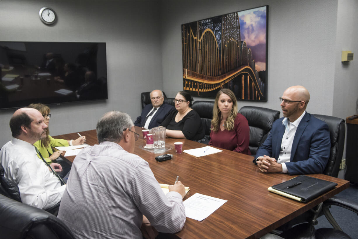 Candidates for the Vancouver Public School board of directors, right, meet with The Columbian Editorial Board in 2019.