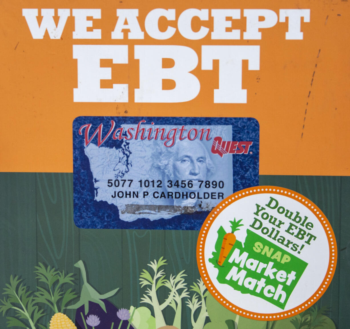 A sandwich board outside the information booth at the Vancouver Farmers Market in 2020 highlights the benefits for EBT card users and members of the Supplemental Nutrition Assistance Program. After SNAP benefits received a boost in 2021, SNAP benefit use at the farmers market increased by 450 percent.