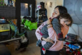 Monica Zazueta, 37, of Vancouver comforts her toddler, Rafio Zazueta, 1, after he took a tumble on the floor at their home Feb. 15. Zazueta and her family, who experienced homelessness a few years ago, are now housed and paying rent of almost $1,900 a month. She fears the family will become homeless again. &ldquo;We&rsquo;re surviving through love,&rdquo; she said. &ldquo;Our kiddos don&rsquo;t deserve this kind of life.