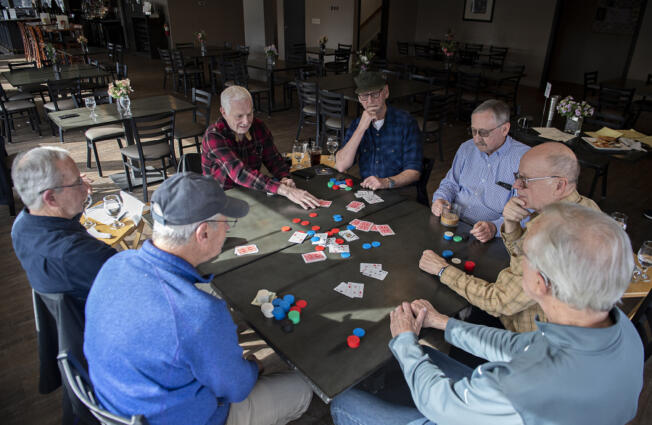 This longtime group of poker buddies has been gathering monthly for friendly, low-stakes games since 1968, first at their homes, more recently at Orchard Hills Country Club in Washougal. Clockwise around the table are Mike Cullivan (in ball cap), Jack Connolly, Phil Kalberer, Jim Kenney, Tom Skyler, Bob Haley and Alan Lee.