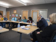 Gov. Jay Inslee, second from right, and his wife, Trudi, meet with local teachers, parents, administrators and staff to talk about special education challenges at Ogden Elementary School on Feb. 9.