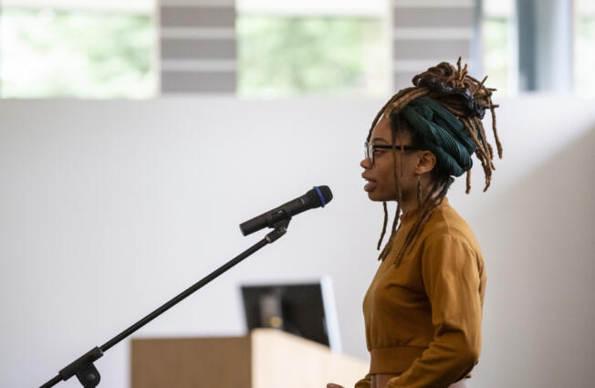 A copy of poet and author Jae Nichelle&rsquo;s book &ldquo;God Themselves&rdquo; sits on a table Thursday at the Firstenburg Student Commons at Washington State University Vancouver. At the end of her performance, Nichelle gave away a free copy of her book to a student.
