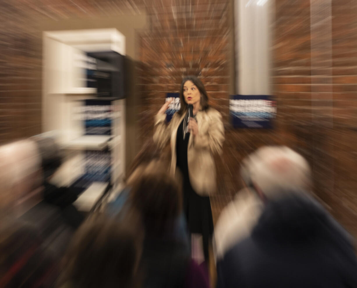 Presidential candidate Marianne Williamson talks to a room of attendees Thursday, March. 7, 2024, at The Valiant Ballroom in Vancouver. After Super Tuesday, Williamson is the last remaining notable primary challenger to President Biden.