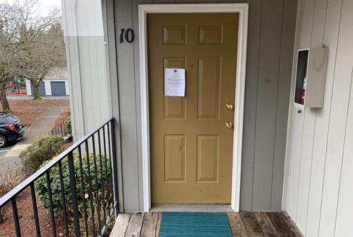 An eviction notice hangs on the door of Rhonda Keith and Corey Elvetici&rsquo;s former apartment.