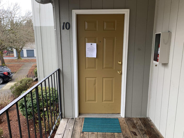 An eviction notice hangs on the door of Rhonda Keith and Corey Elvetici’s former apartment. (Alexis Weisend/The Columbian)