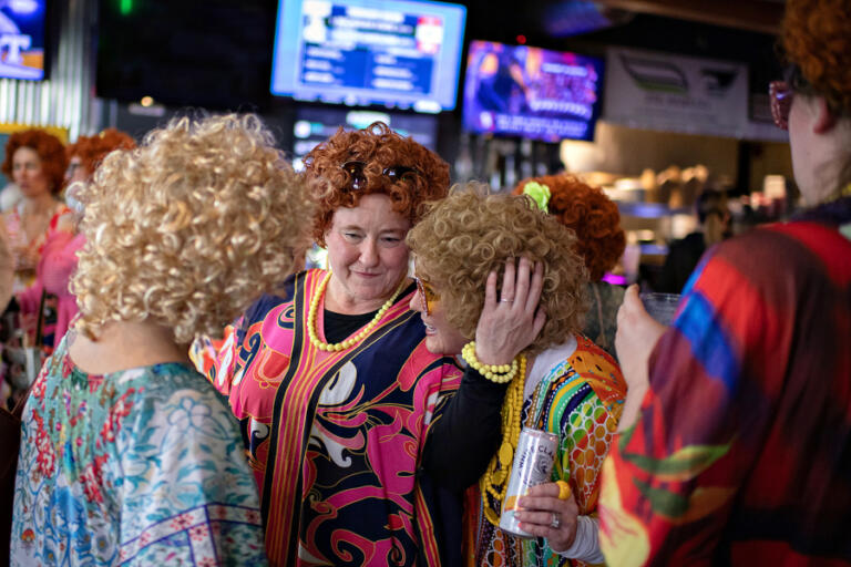 Linda Dollar of Battle Ground, from left, joins friends Dana Schreiber, also of Battle Ground, and Cassandra Blakeslee of La Center at Playmakers Sports Bar &amp; Grill during Saturday&rsquo;s Mrs.