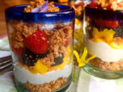 Whipped coconut cream is delicious and light with sweet fruit and toasted cashew crumble.