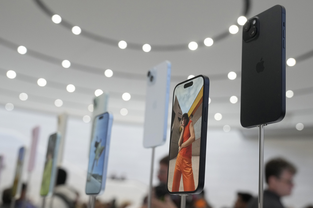 FILE - iPhone 15 phones are shown during an announcement of new products on the Apple campus in Cupertino, Calif., Sept. 12, 2023. The Justice Department announced a sweeping antitrust lawsuit Thursday, March 21, 2024 against Apple, accusing the tech giant of having an illegal monopoly over smartphones in the U.S.