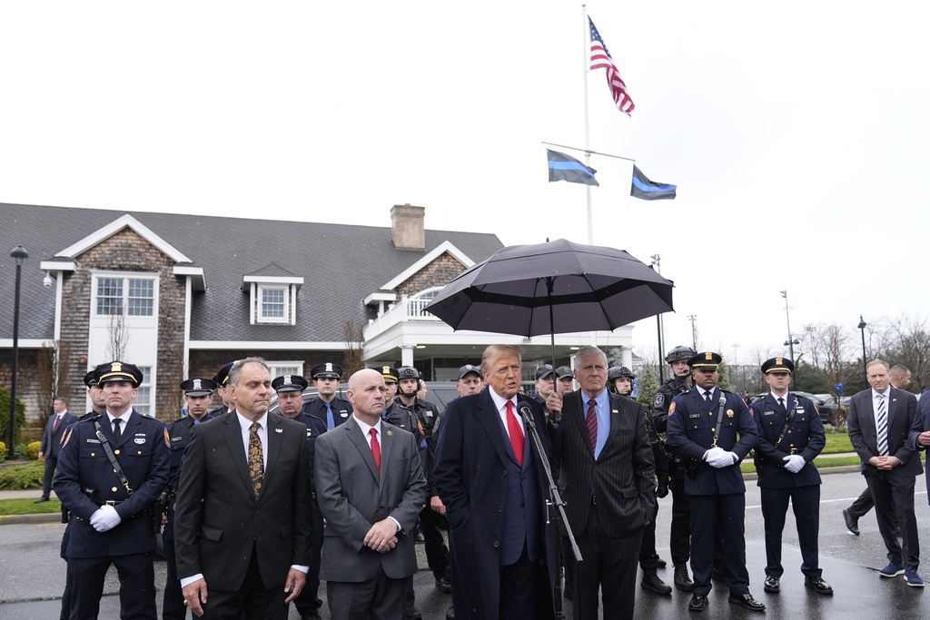 Former President Donald Trump speaks during a news conference after attending the wake of New York City police officer Jonathan Diller, Thursday, March 28, 2024,  in Massapequa Park, N.Y.  Diller was shot and killed Monday during a traffic stop, the city's mayor said. It marked the first slaying of an NYPD officer in two years.