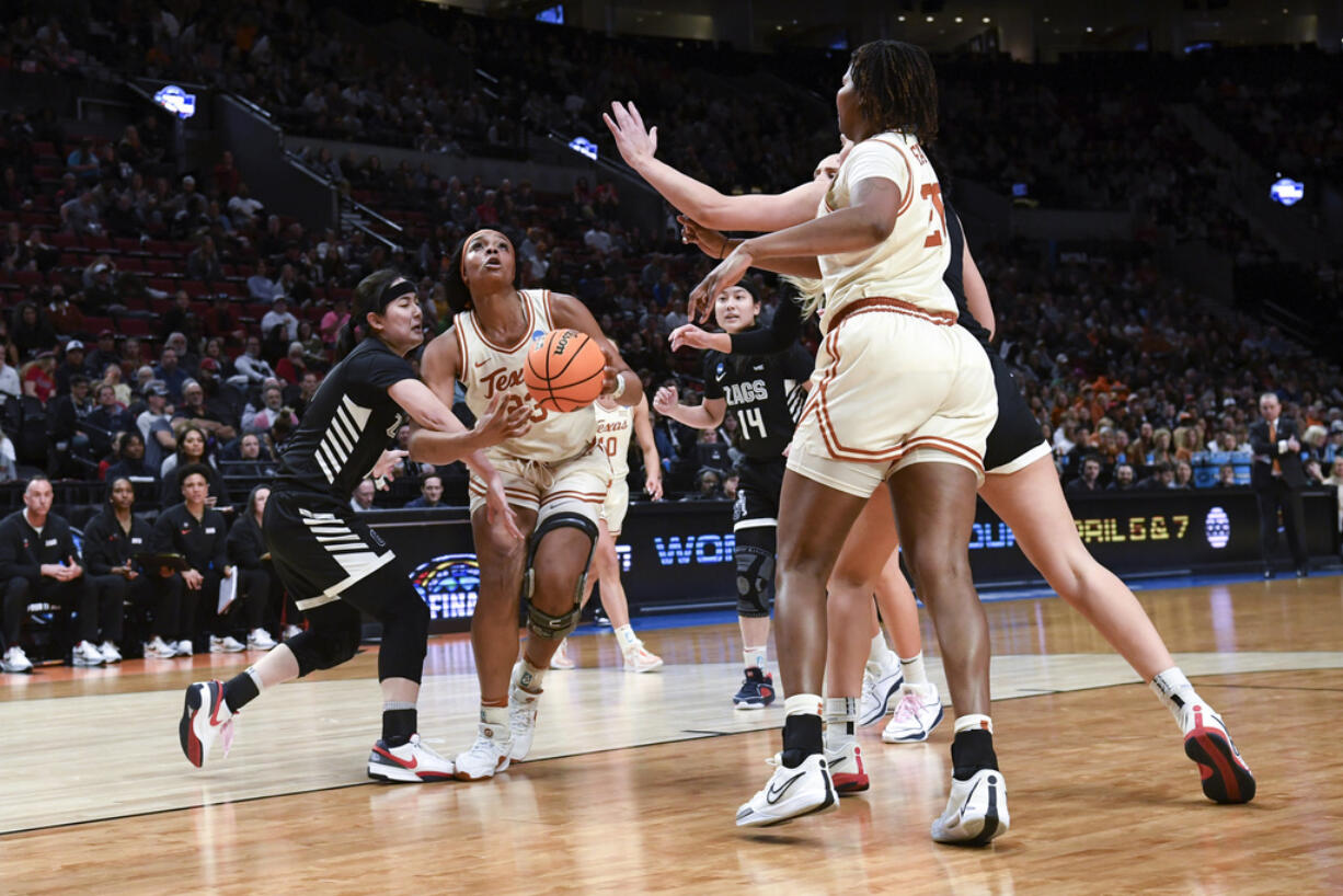 Texas forward Aaliyah Moore (23) looks to shoot against Gonzaga during the first half of a Sweet 16 college basketball game in the women's NCAA Tournament, Friday, March 29, 2024, in Portland, Ore.