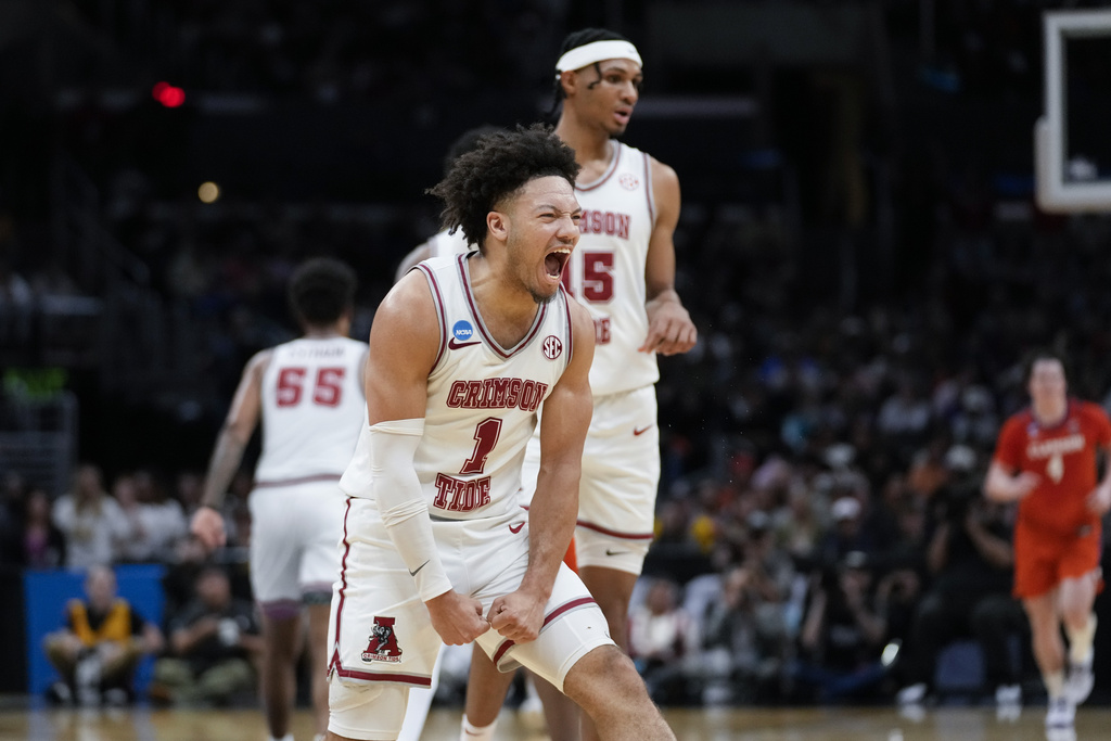 Alabama guard Mark Sears (1) celebrates after scoring during the first half of an Elite 8 college basketball game against Clemson in the NCAA tournament Saturday, March 30, 2024, in Los Angeles.