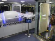 New Transporation Security Administration self-screening equipment is in use March 6 at Harry Reid International Airport in Las Vegas.