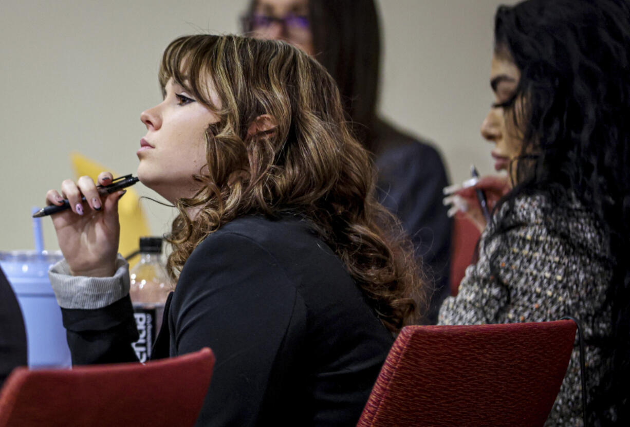 Hannah Gutierrez-Reed listens while expert witness Bryan Carpenter testifies during Gutierrez-Reed&#039;s trial on involuntary manslaughter and tampering with evidence charges in state district court in Santa Fe, N.M., on Thursday, Feb. 29, 2024.