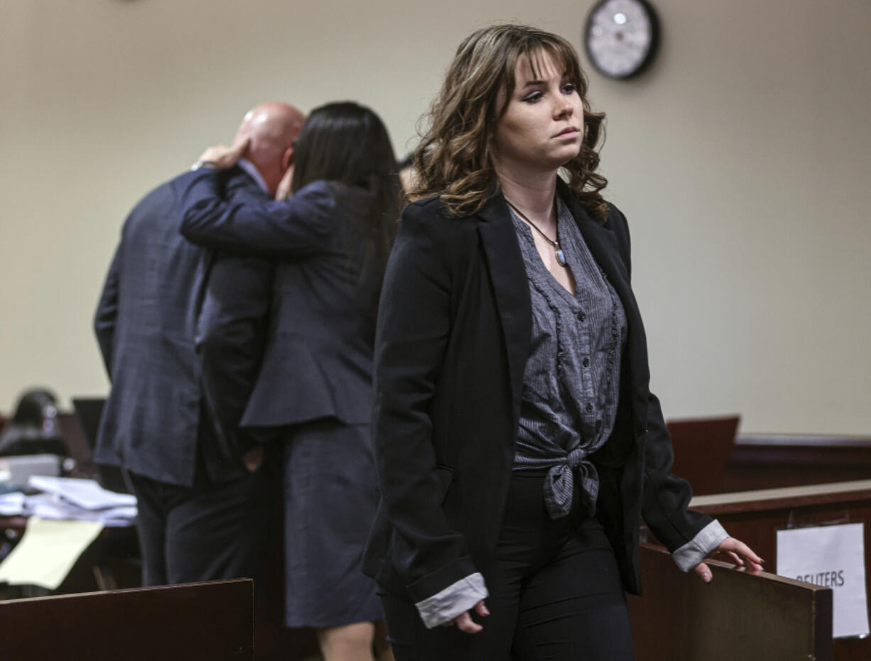 Hannah Gutierrez-Reed leaves the courtroom during a break in her trial on involuntary manslaughter and tampering with evidence charges in Santa Fe, N.M., Thursday, Feb. 29, 2024.