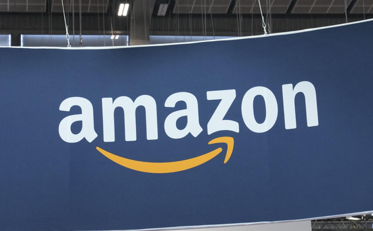 FILE - The Amazon logo is photographed at the Vivatech show in Paris, on June 15, 2023.  Amazon says, Wednesday, March 27, 2024, its investing another $2.75 billion in the Artificial intelligence startup Anthropic, bringing its total investment in the company to $4 billion. The investment will give Amazon a minority stake in San Francisco-based Anthropic, which is a rival to OpenAI, the maker of the popular chatbot ChatGPT.