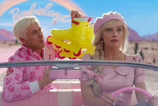 This image released by Warner Bros. Pictures shows Ryan Gosling, left, and Margot Robbie in a scene from &ldquo;Barbie.&rdquo; (Warner Bros.
