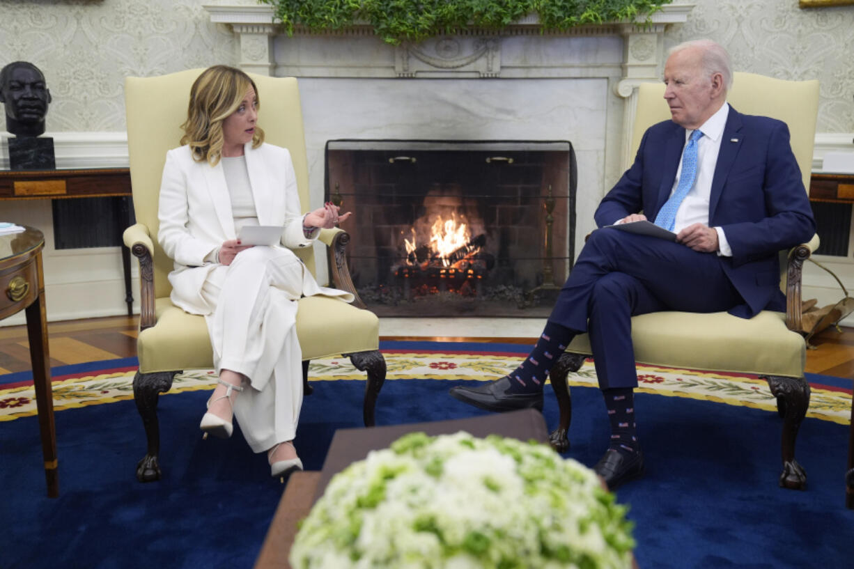 President Joe Biden meets Italian Prime Minister Giorgia Meloni in the Oval Office of the White House, Friday, March 1, 2024, in Washington.
