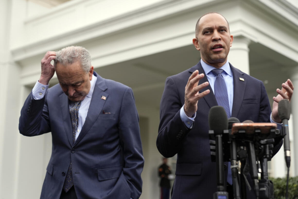 House Minority Leader Hakeem Jeffries, D-N.Y., speaks as Senate Majority Leader Chuck Schumer of N.Y., listens outside the West Wing after meeting with President Joe Biden at the White House in Washington, Tuesday, Feb. 27, 2024.
