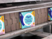 This image provided by Perrigo Company shows boxes of Opill, the first over-the-counter birth control pill available later this month in the United States. Manufacturer Perrigo said Monday, March 4, 2024 that it has begun shipping the medication, called Opill, to major retailers and pharmacies.