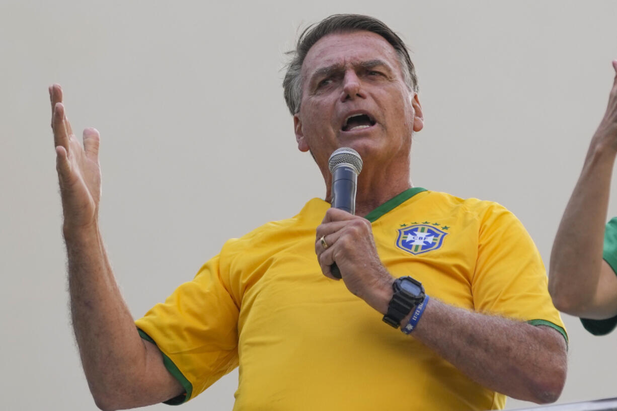 Former President Jair Bolsonaro addresses supporters during a rally in Sao Paulo., Brazil, Sunday, Feb. 25, 2024. Bolsonaro and some of his former top aides are under investigation into allegations they attempted plotted a coup to remove his successor, Luiz Inacio Lula da Silva.
