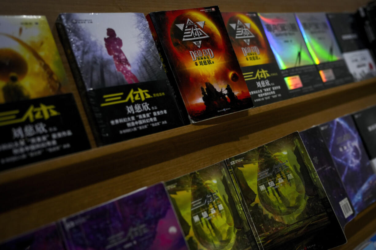 Copies of &ldquo;The Three-Body Problem&rdquo; on display at a bookstore in Beijing on Monday, Feb. 19, 2024. The series, written by former engineer Liu Cixin, helped Chinese science fiction break through internationally, winning awards and making it onto the reading lists of the likes of former U.S. President Barack Obama and Mark Zuckerberg.