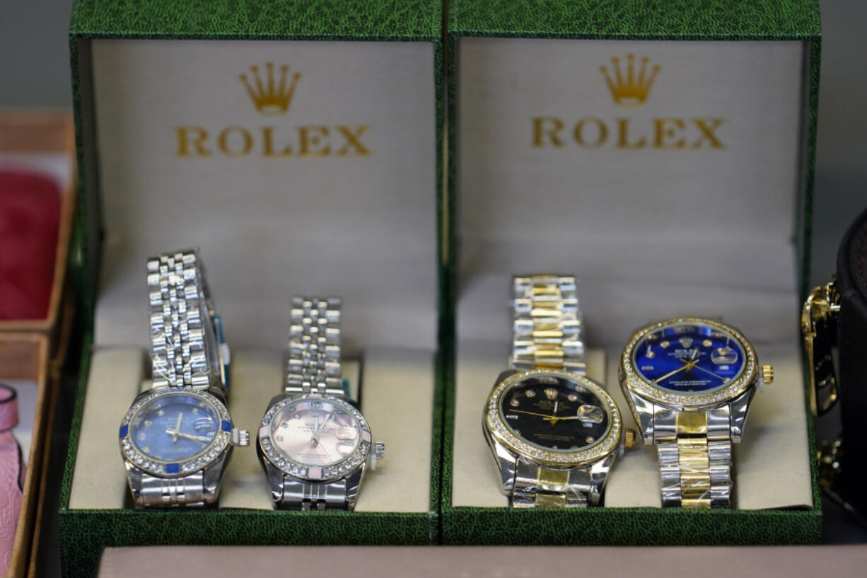 Fake Rolex watches are displayed at the U.S. Customs and Border Protection overseas mail inspection facility at Chicago&rsquo;s O&rsquo;Hare International Airport Feb. 23, 2024, in Chicago. The explosive growth of cross-border e-commerce involving major China-backed players such as Shein and Temu has caught the attention of the U.S. lawmakers amid a bitter U.S.-China trade war and cast a spotlight on a tax rule that critics say has allowed hundreds of millions of China-originated packages to enter the U.S. market each year without duty and without reliable information for lawfulness.