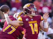 The Seattle Seahawks are acquiring quarterback Sam Howell from the Washington Commanders in a swap of draft picks, according to a person familiar with the trade on Thursday, March 14, 2024.