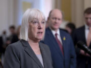 Senate Appropriations Committee Chair Patty Murray, D-Wash., speaks to reporters at the Capitol in Washington, Tuesday, March 12, 2024. (AP Photo/J.