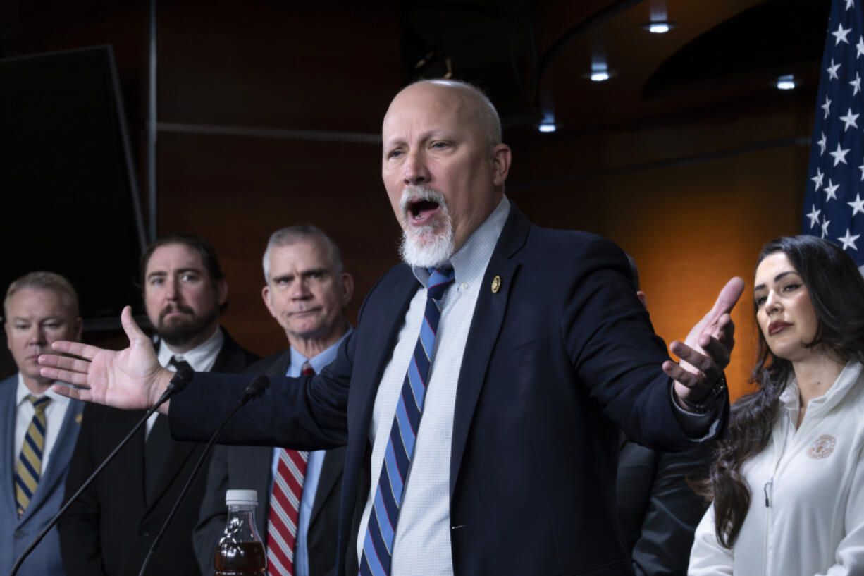 Rep. Chip Roy, R-Texas, and members of the conservative House Freedom Caucus, denounce the spending package being readied for a vote, at the Capitol in Washington, Friday, March 22, 2024. (AP Photo/J.