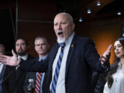 Rep. Chip Roy, R-Texas, and members of the conservative House Freedom Caucus, denounce the spending package being readied for a vote, at the Capitol in Washington, Friday, March 22, 2024. (AP Photo/J.