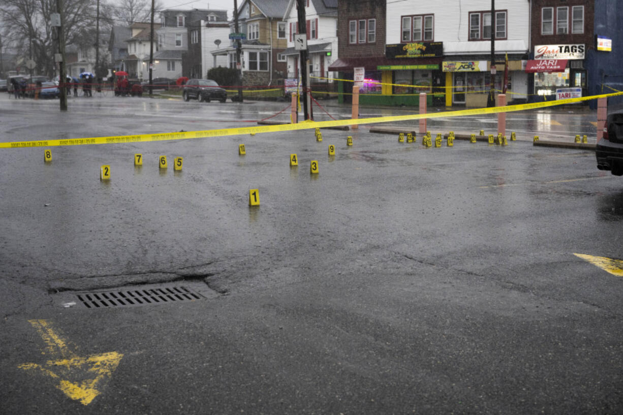 Evidence markers are seen following a shooting in Northeast Philadelphia on Wednesday, March 6, 2024. Four shootings over four days in Philadelphia left three dead and 12 injured, many of them children &mdash; violence that put renewed focus on safety within the sprawling mass transit system and gave ammunition to critics of the city&#039;s progressive chief prosecutor.
