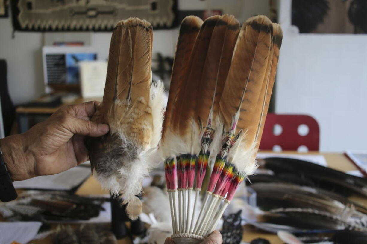 Non-eagle bird carcasses and bird feathers are stored at the Liberty Wildlife Non-Eagle Feather Repository in Phoenix, Tuesday, Feb. 27, 2024. Citizens of federally recognized Native American tribes who are 18 and older can request items from the repository for religious and ceremonial purposes.