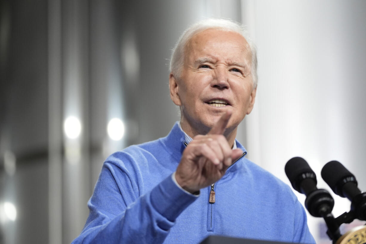 FILE - President Joe Biden speaks at the Earth Rider Brewery, Jan. 25, 2024, in Superior, Wis. Biden is visiting Wisconsin and Michigan, looking to shore up a &ldquo;blue wall&rdquo; of swing states that long backed Democrats in presidential races.