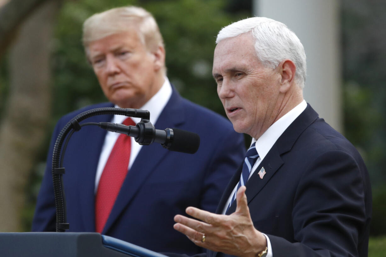 FILE - President Donald Trump listens as Vice President Mike Pence speaks during a briefing at the White House, March 29, 2020, in Washington. In an interview with Fox News Channel Friday, March 15, 2024, Pence said he will not be backing Donald Trump in the 2024 election. &quot;It should come as no surprise that I will not be endorsing Donald Trump this year,&quot; he said.