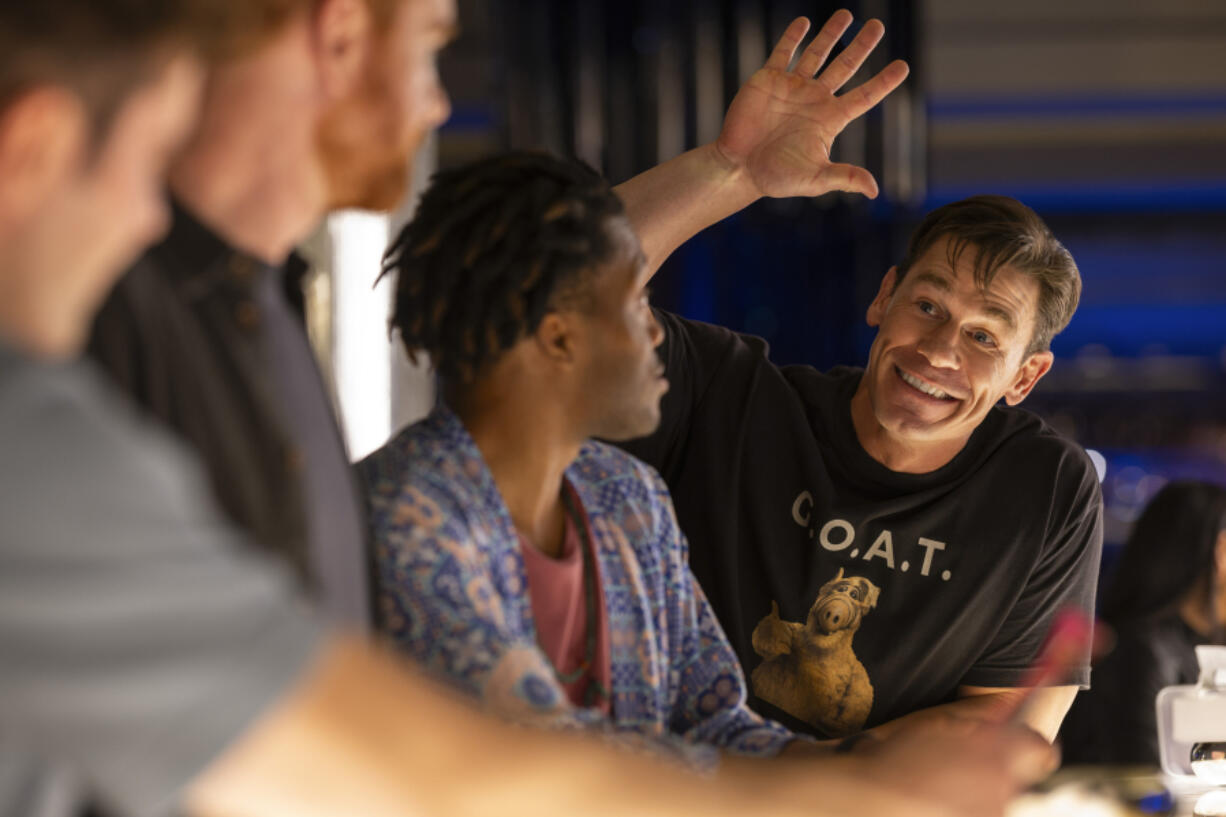 This image released by Amazon Prime shows John Cena, right, in a scene from &ldquo;Ricky Stanicky.&rdquo; (Ben King/Amazon via AP)