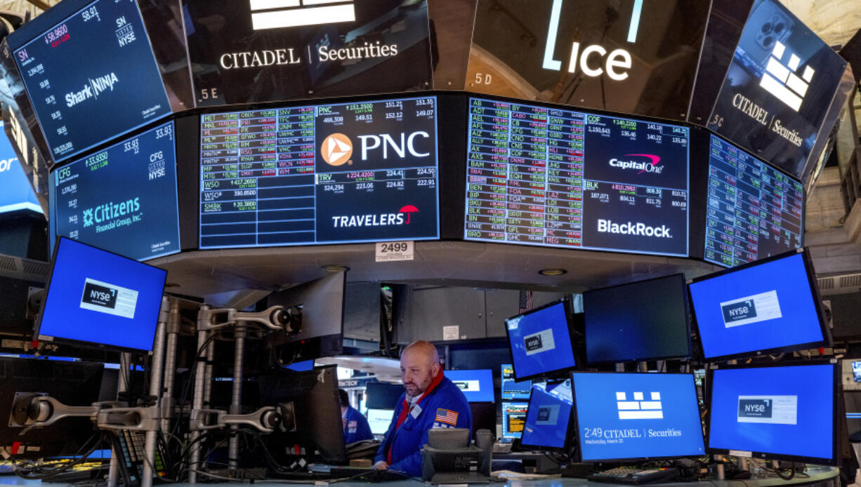 A trader works on the floor of the New York Stock Exchange Wednesday, March 20, 2024. U.S. Federal Reserve Board Chairman Jerome Powell announced that there was no rate cuts today, but signaled there may be later in the year.